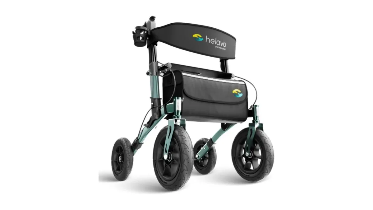 Helavo Outdoor‑Rollator auf Waldweg mit großen Profilreifen, dunkelgrün-schwarz